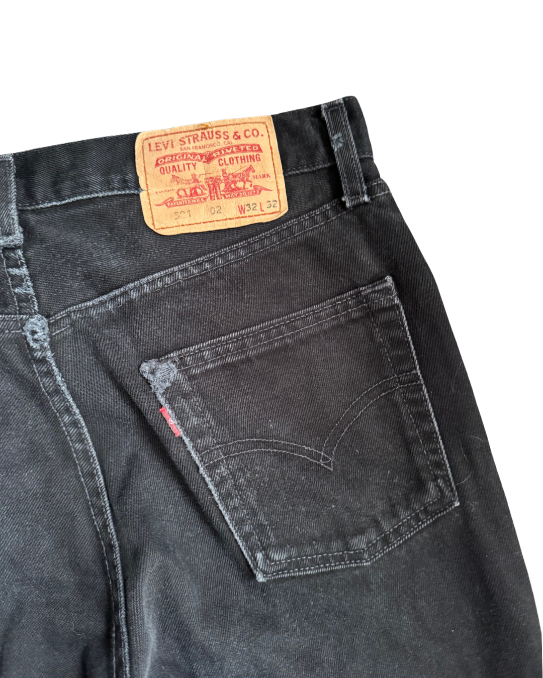 Levis 521: Noir Black (W33 L32)
